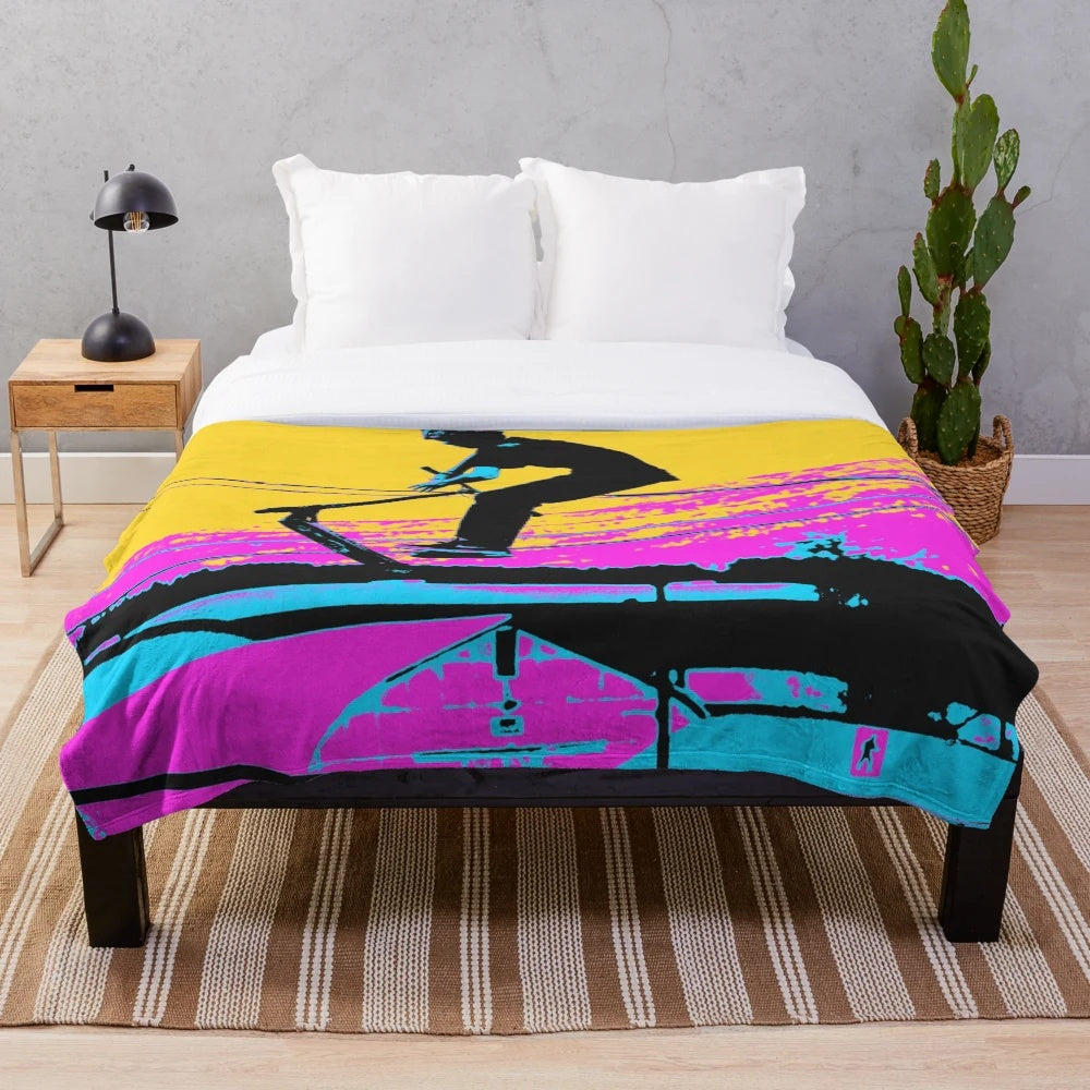 Plush blanket featuring a stunt scooter rider design