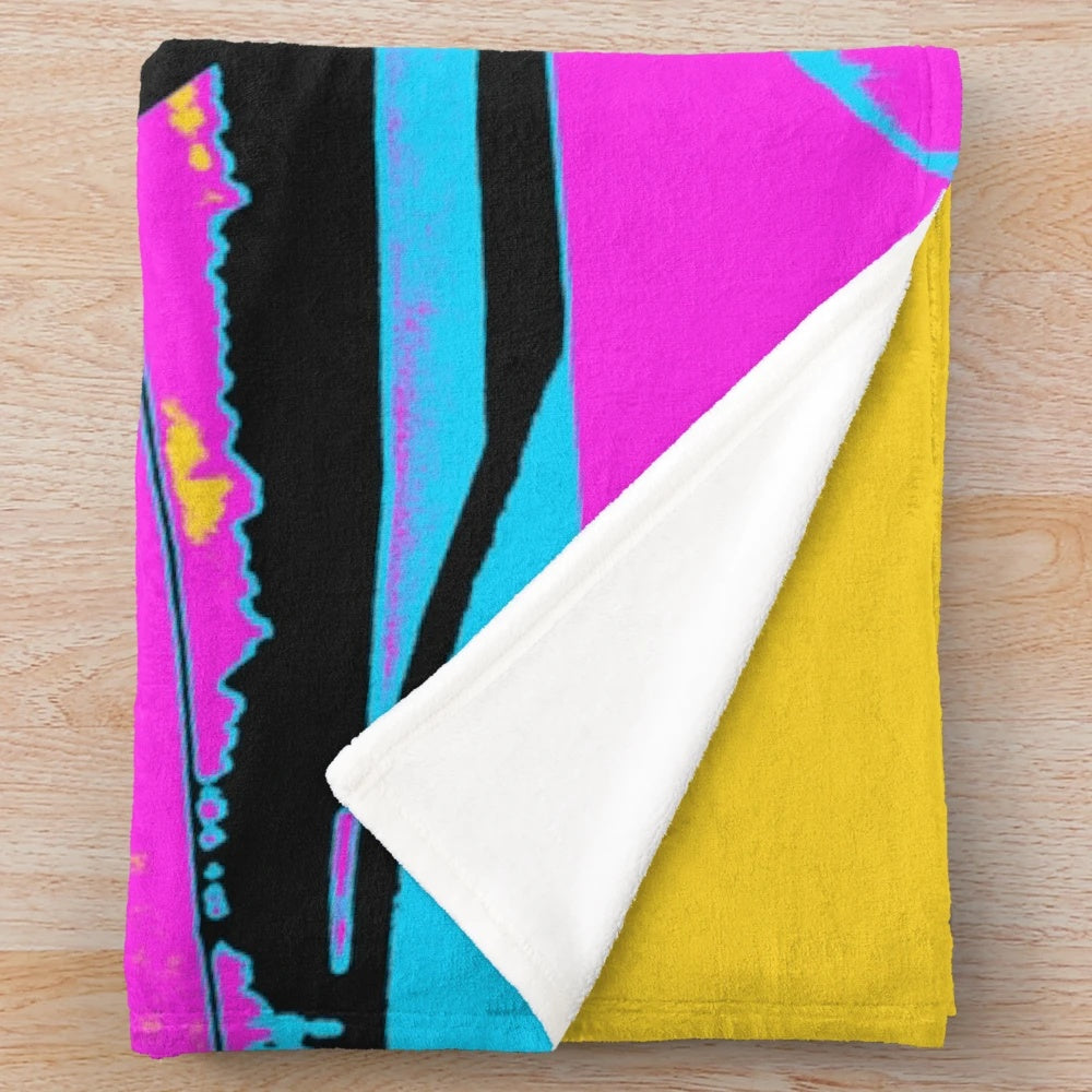 Plush blanket featuring a stunt scooter rider design