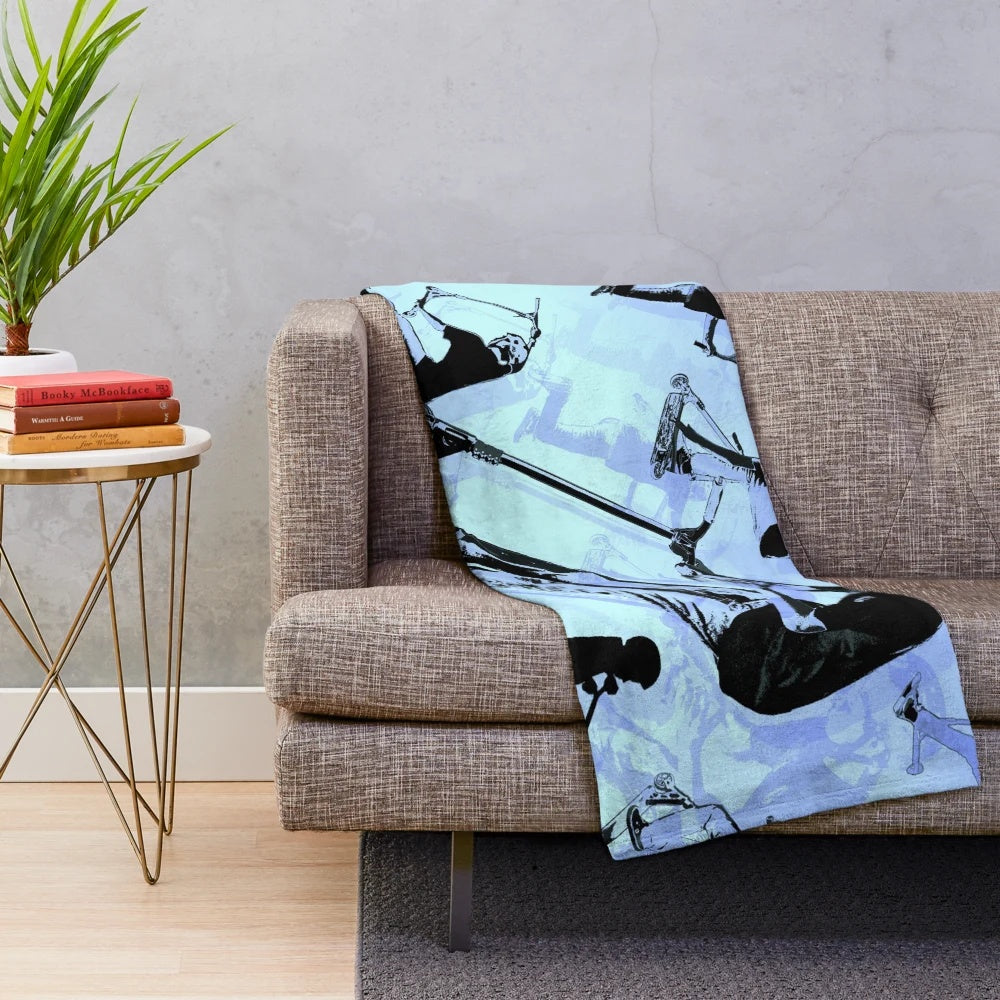 Scooter tricks plush blanket with black and blue design