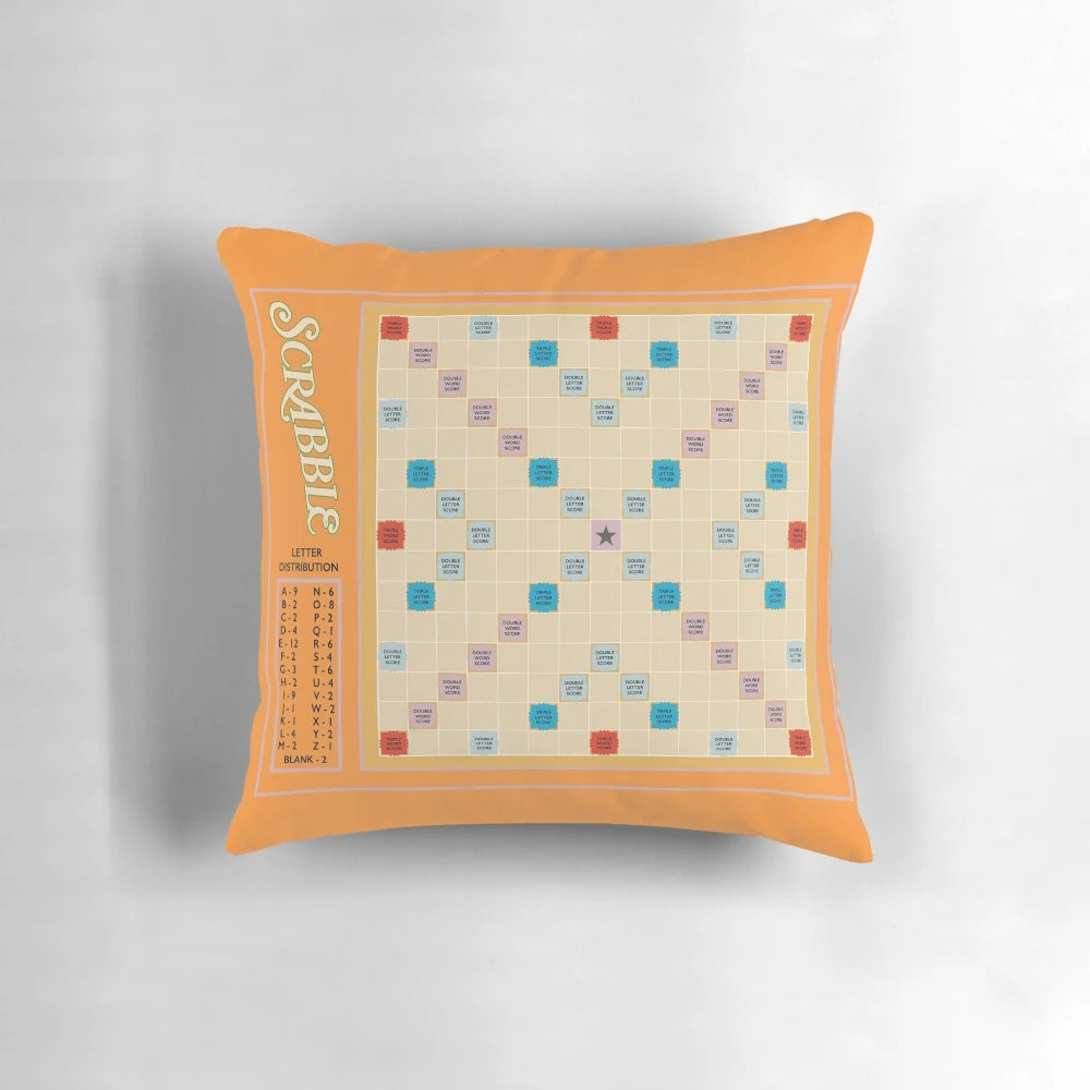 Scrabble-themed throw pillow with colorful game tiles