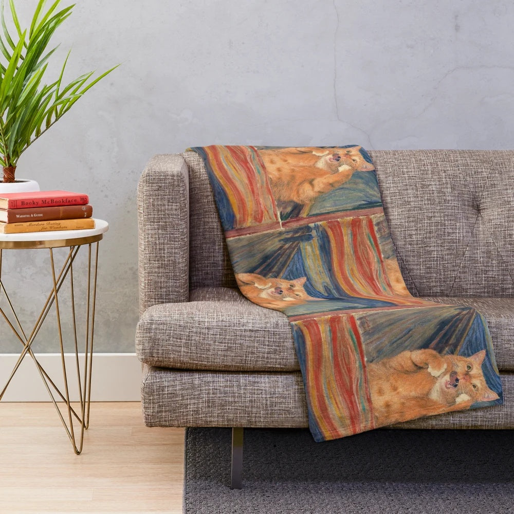 Scream painting with a cat design on a plush blanket