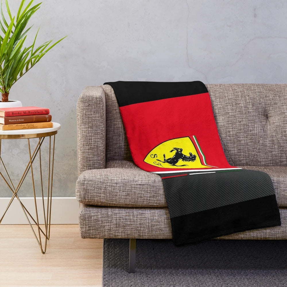 Soft and cozy plush blanket featuring the iconic Scuderia Ferrari logo