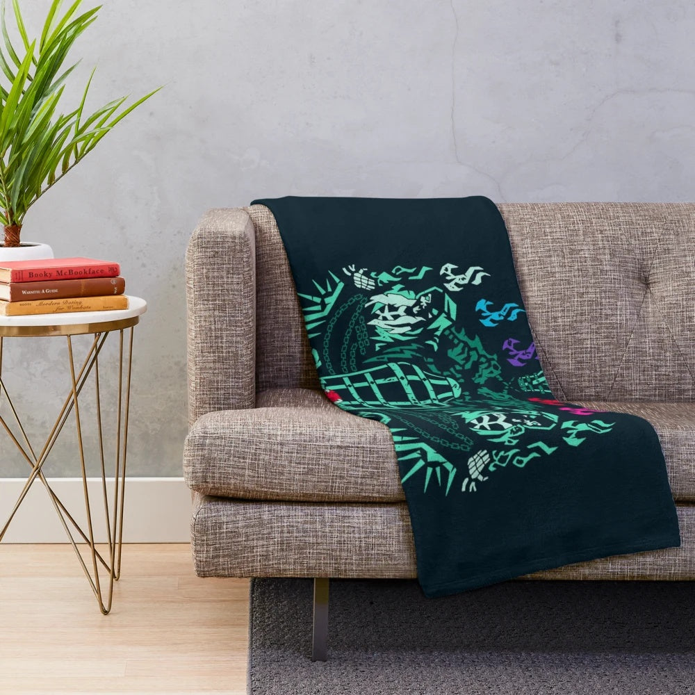 Sea of Thieves inspired plush blanket featuring the game's iconic skull logo and kraken design