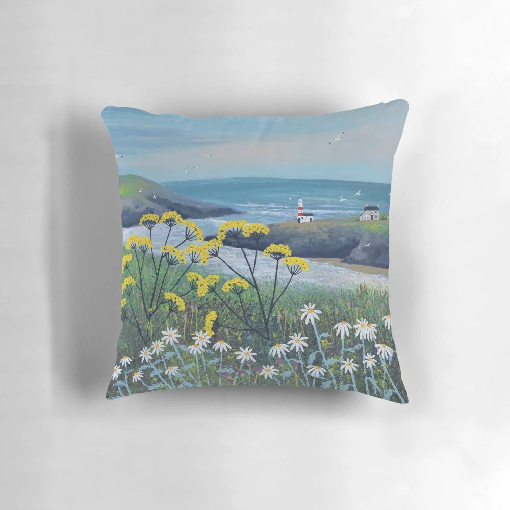 Decorative seaside inspired pillow with coastal cottage and floral design