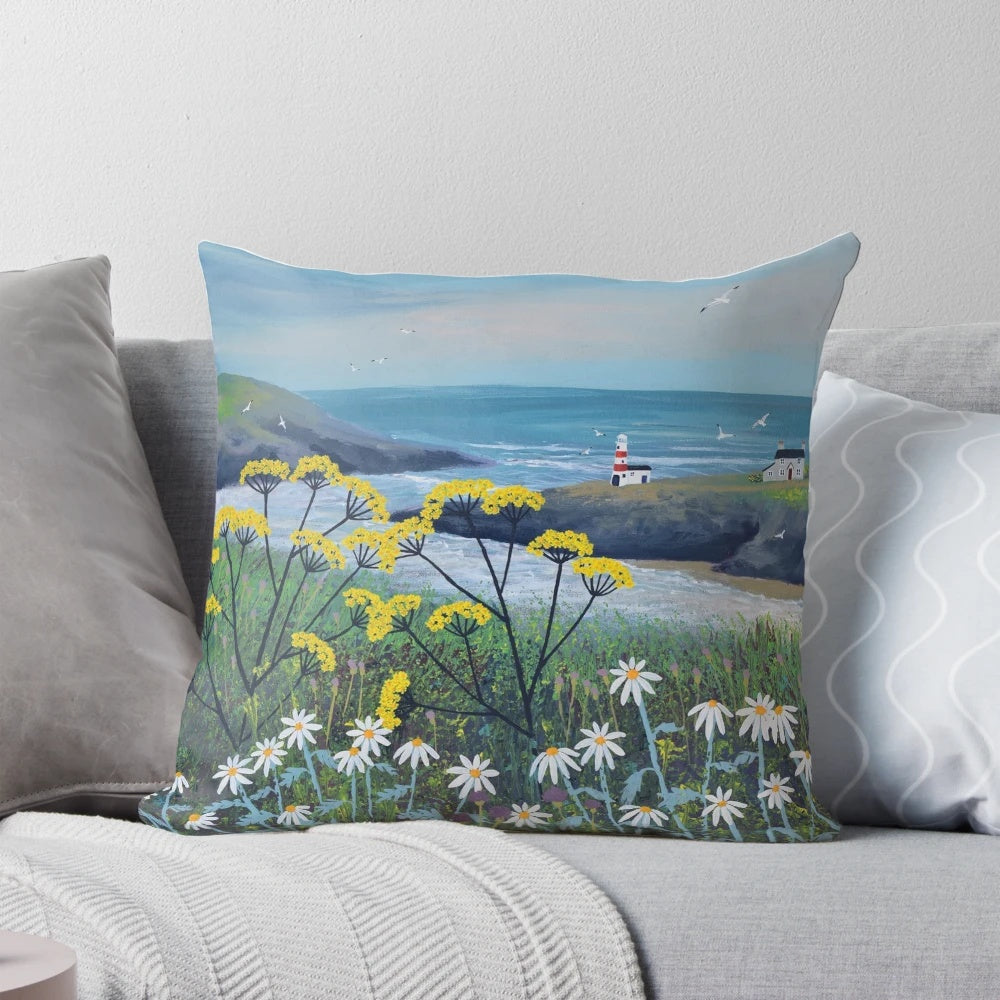 Decorative seaside inspired pillow with coastal cottage and floral design