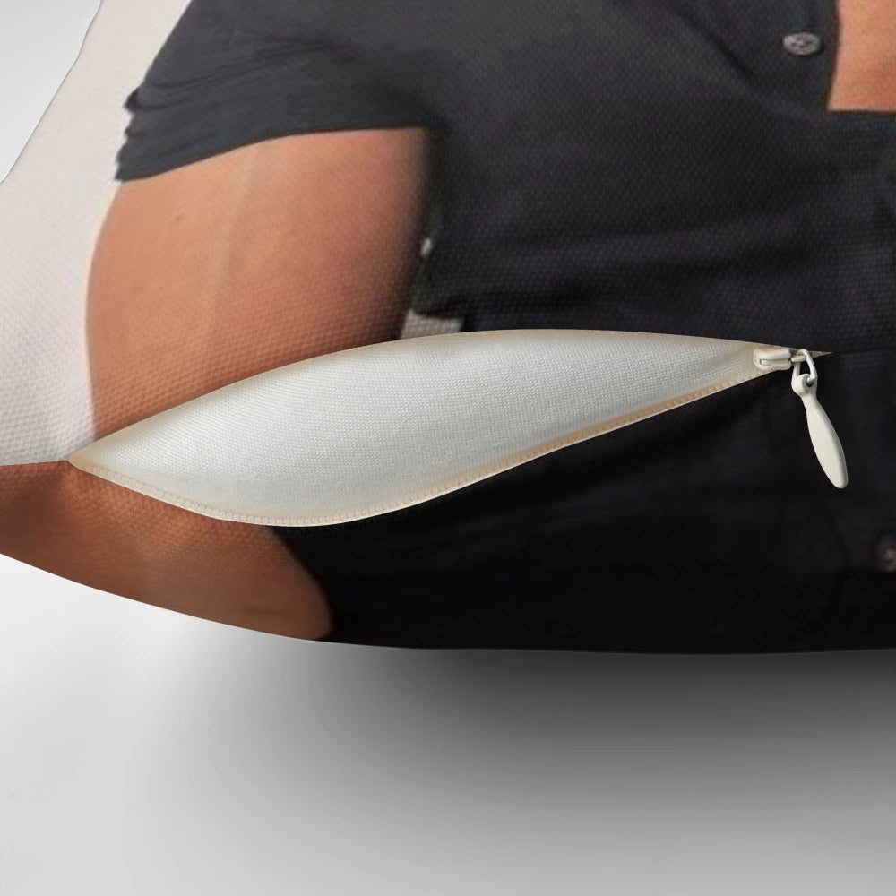Sebastian Stan wearing a black shirt printed on a pillow