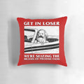 Plush communist-themed pillow with "Get In Loser We're Seizing The Means Of Production" text