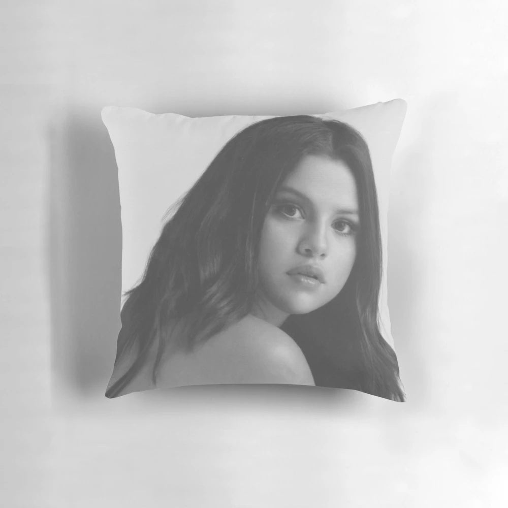 Soft, cozy pillow featuring Selena Gomez's likeness and Rare Beauty branding