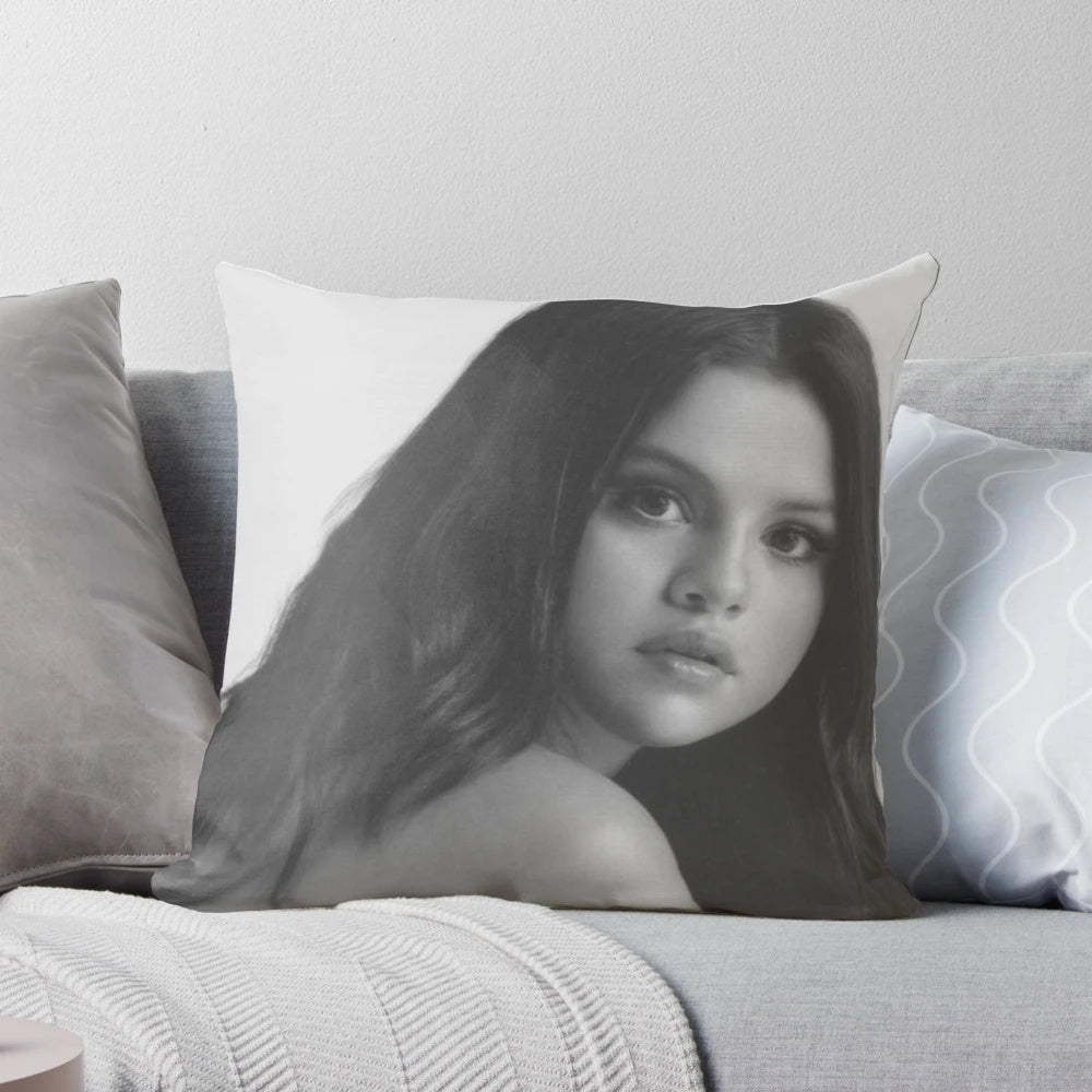 Soft, cozy pillow featuring Selena Gomez's likeness and Rare Beauty branding