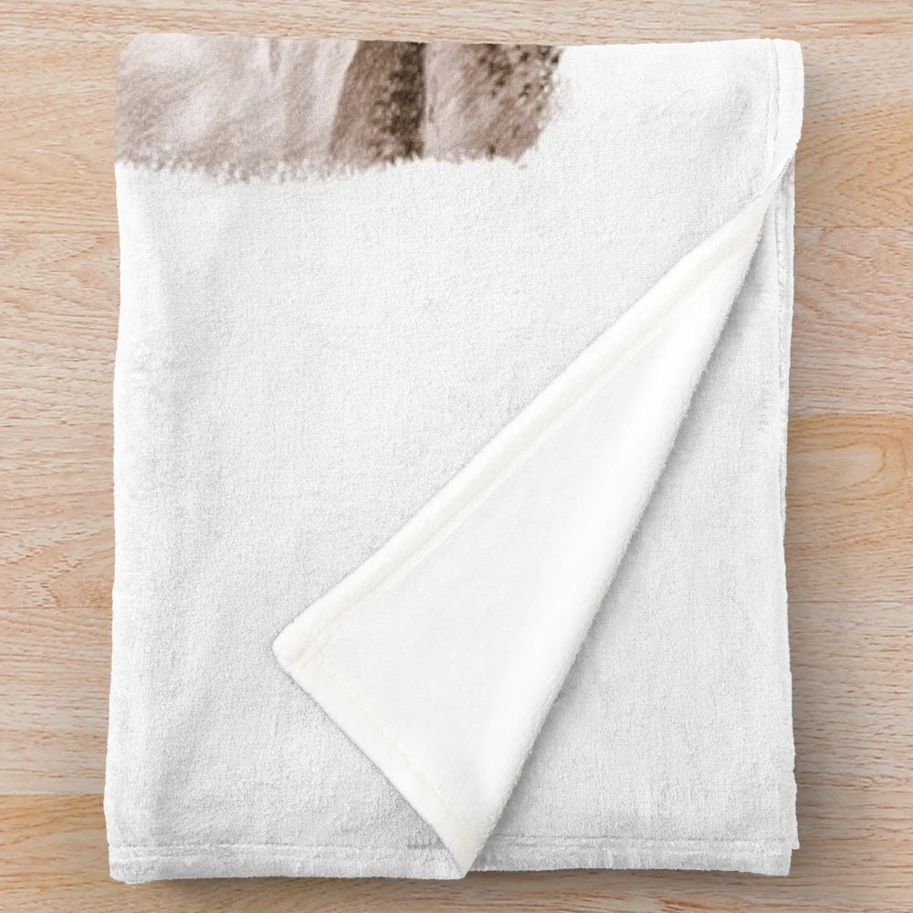 Sepia-toned plush blanket with a realistic drawing of Sam Elliott, the iconic Western actor, in his signature cowboy attire.