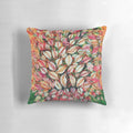 Vibrant pillow featuring the botanical artwork of French painter Seraphine Louis, showcasing colorful plant leaves and foliage.