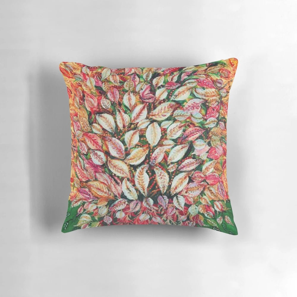 Vibrant pillow featuring the botanical artwork of French painter Seraphine Louis, showcasing colorful plant leaves and foliage.
