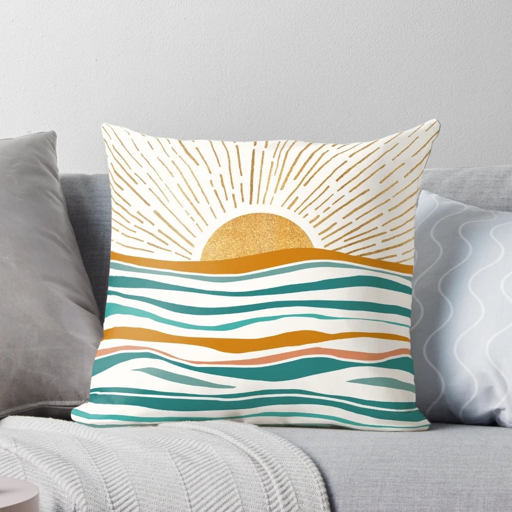 Abstract landscape pillow design featuring a blue sky, ocean waves, and golden sunshine