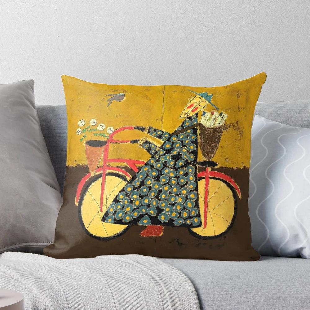 Decorative pillow featuring a bicycle-riding Buddhist monk with love letters in the background
