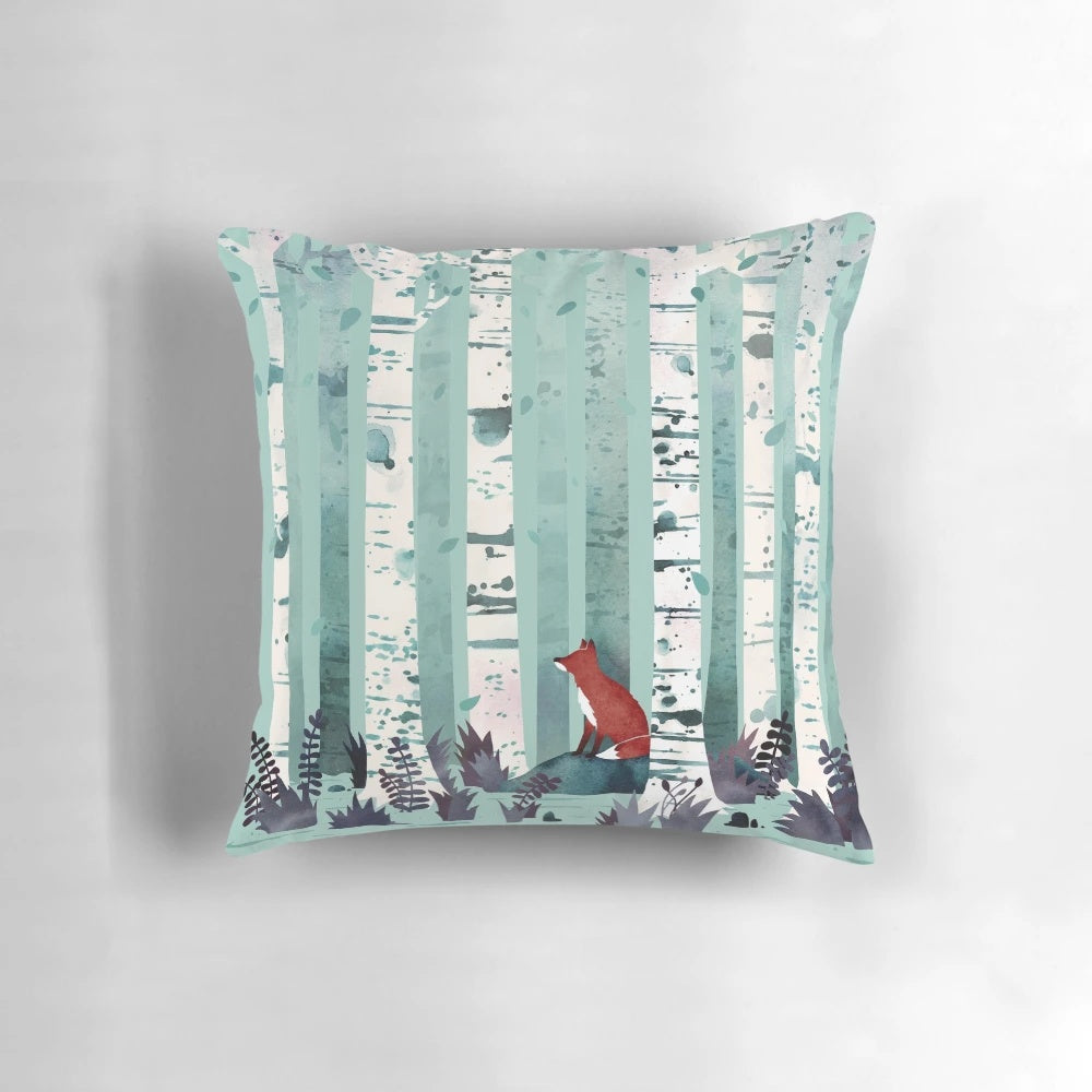 Serene watercolor painting of birch trees in a forest on a decorative throw pillow