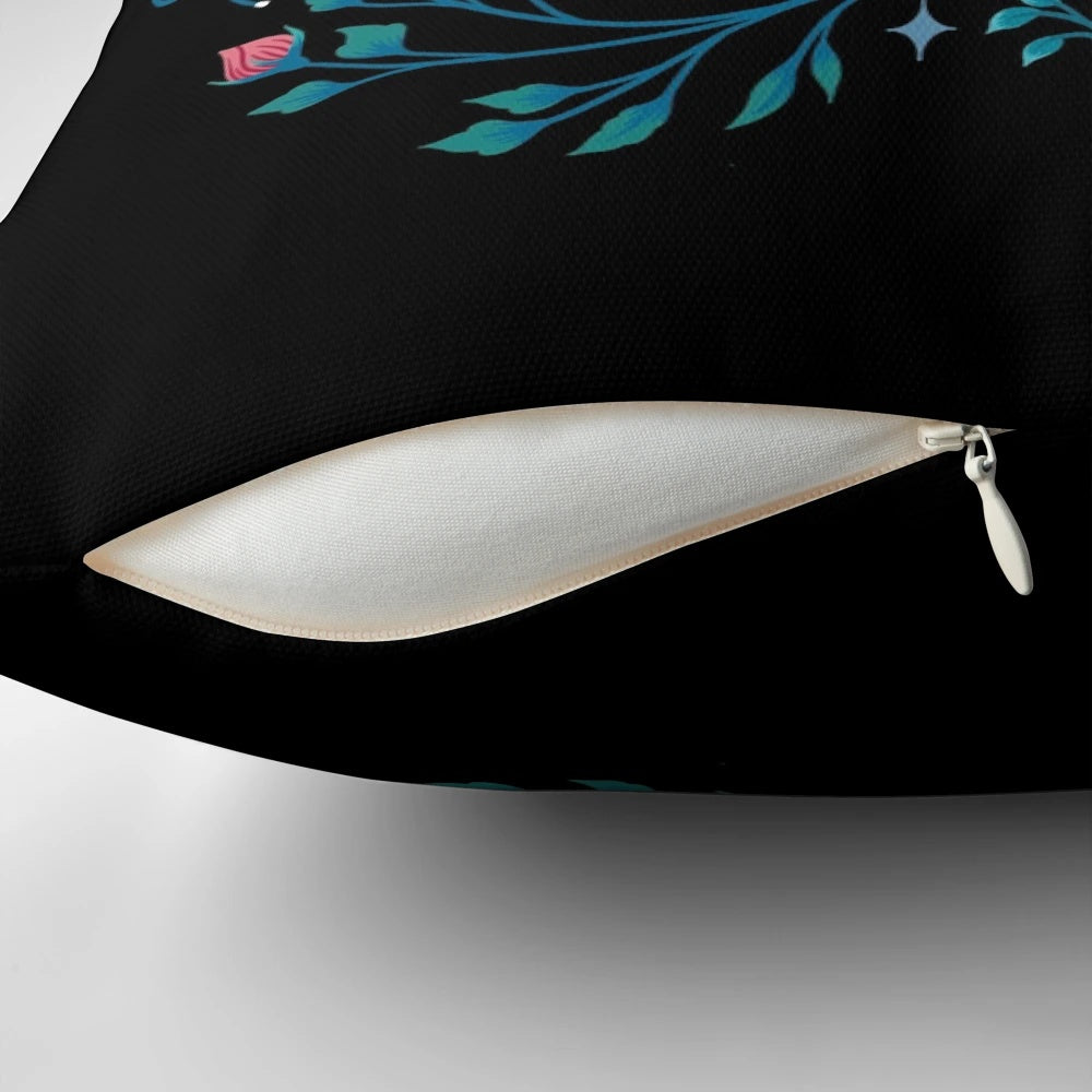 A beautiful black and white botanical throw pillow featuring a full moon and nighttime garden scene.