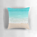 Calming blue ocean shore pillow with waves and beach scenery