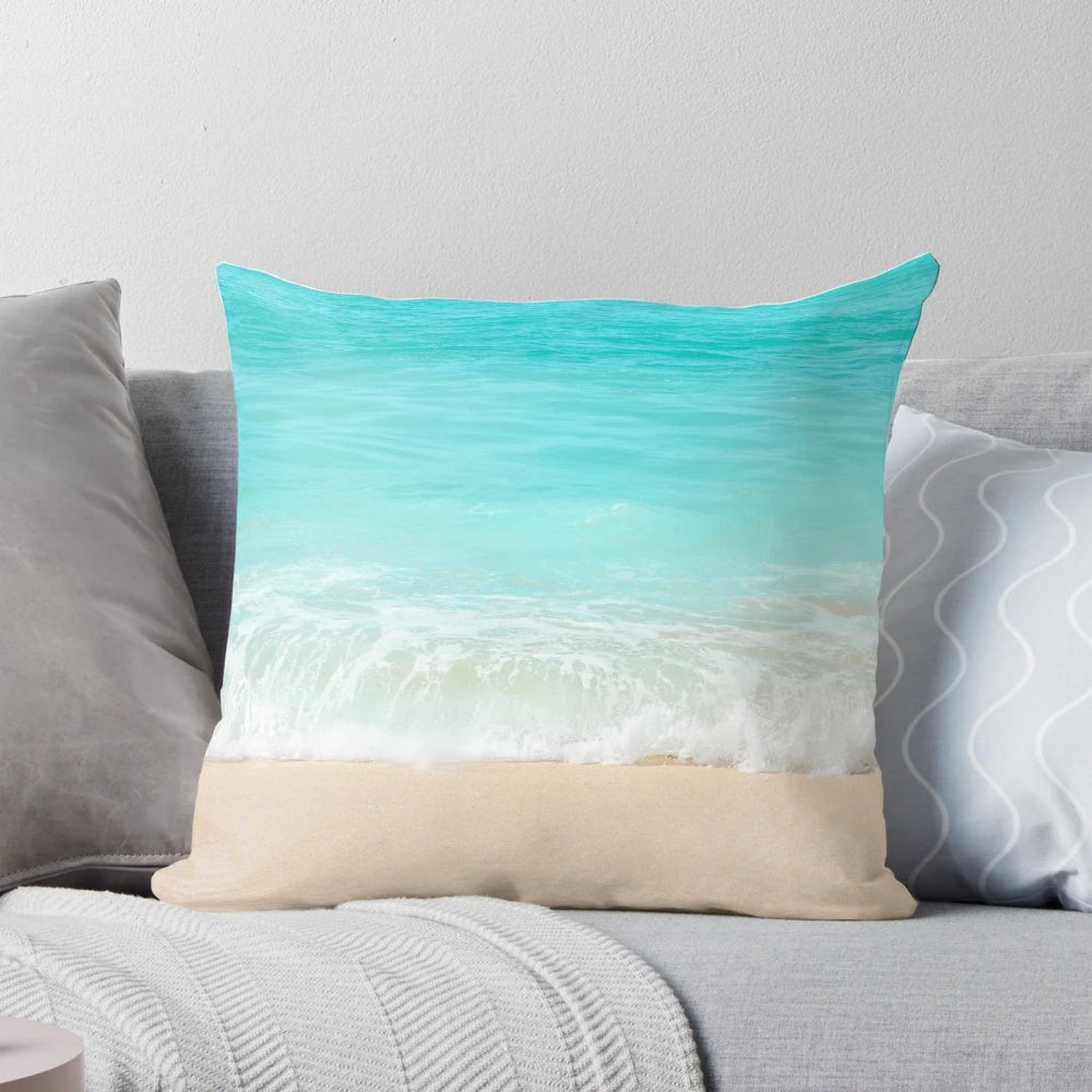 Calming blue ocean shore pillow with waves and beach scenery