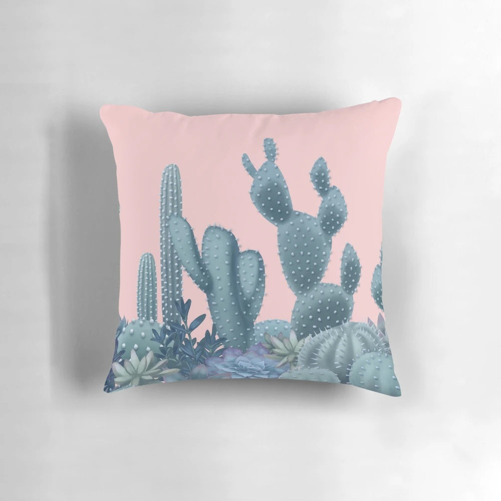 Decorative pillow featuring a soothing design of cacti against a rose quartz background.