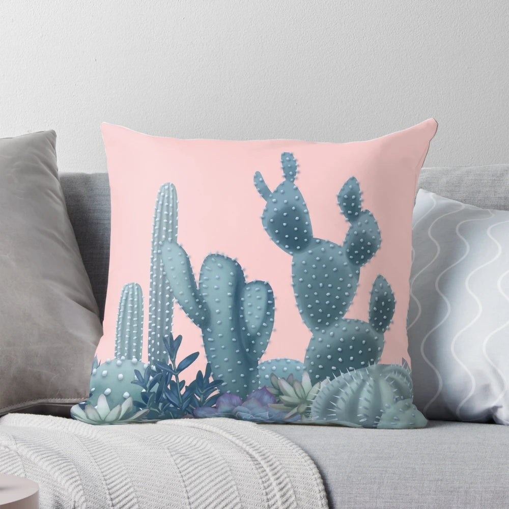 Decorative pillow featuring a soothing design of cacti against a rose quartz background.