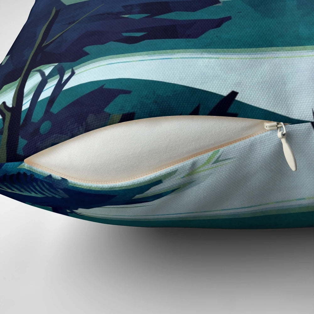 A cozy pillow featuring a beautiful landscape of the Canadian mountains, with a blue sky, green forests, and a tranquil lake or river.