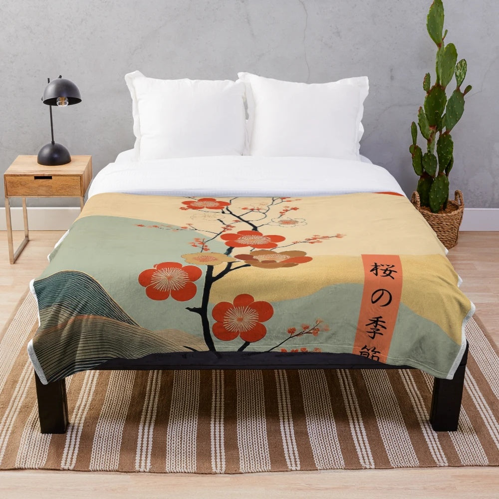 Soft plush blanket with delicate cherry blossom floral design