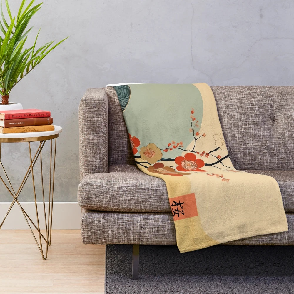 Soft plush blanket with delicate cherry blossom floral design