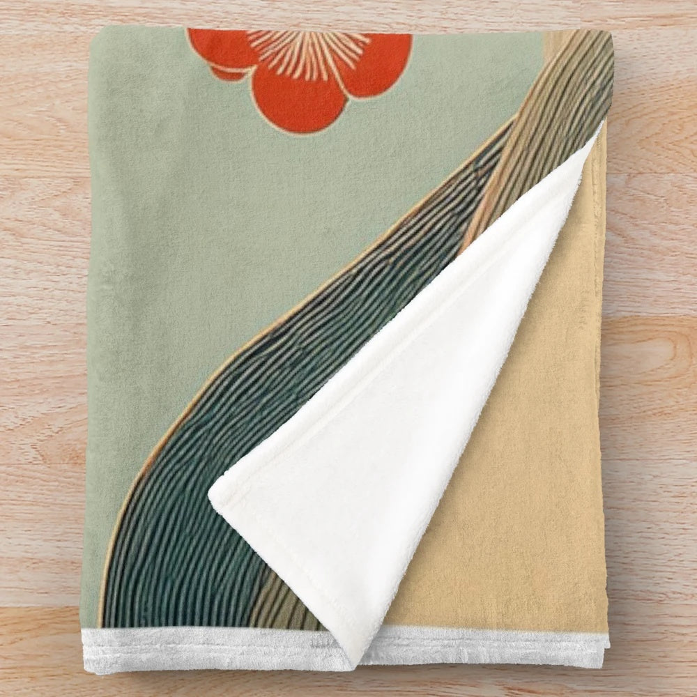 Soft plush blanket with delicate cherry blossom floral design