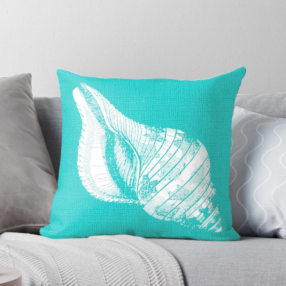Aqua blue and white seashell decorative throw pillow for coastal, beach-inspired home decor