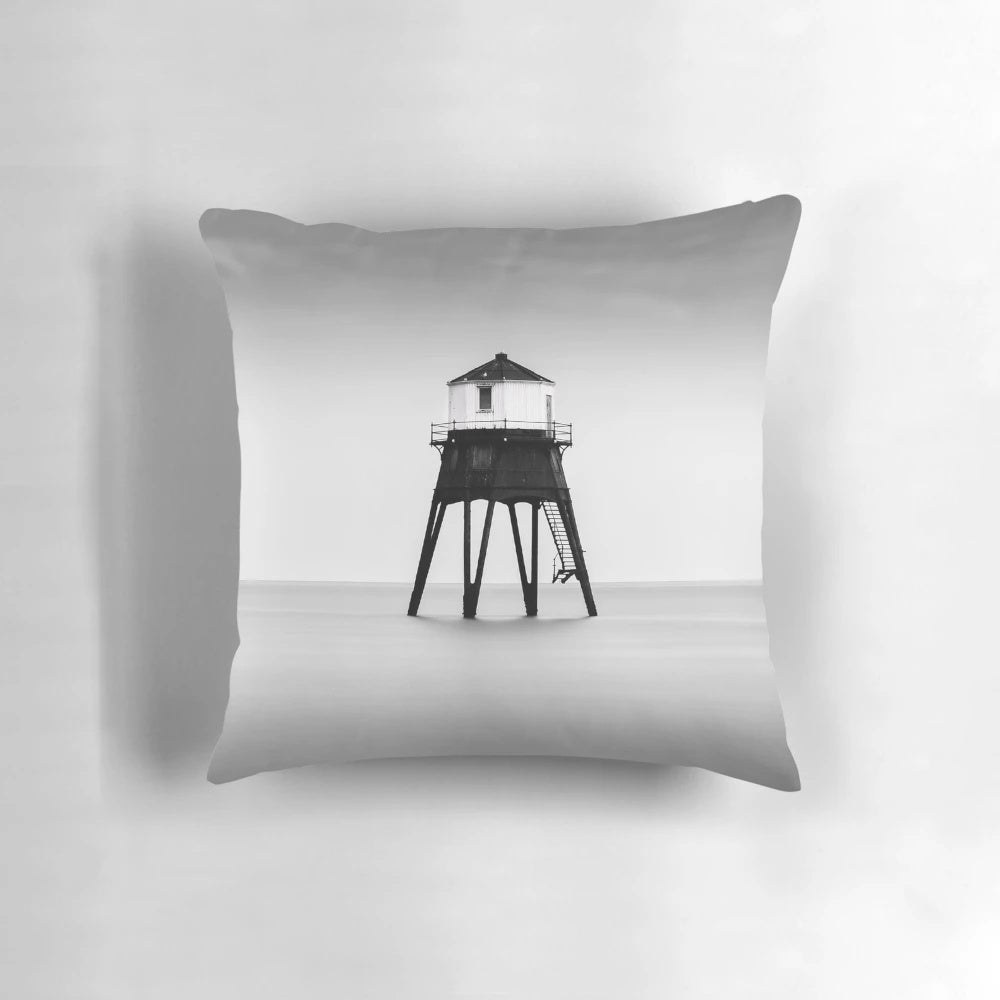 Dramatic black and white photograph of the iconic Dovercourt Lighthouse in Essex, UK, capturing the calm and serene beauty of the seaside structure.