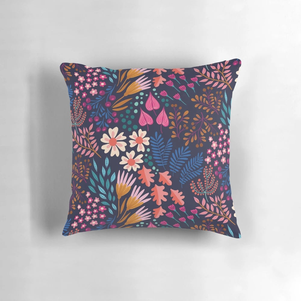 Lush flower field botanical design black floral pillow for a nature-inspired home