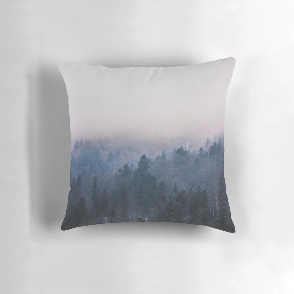 Soft, minimalist pillow featuring a tranquil forest landscape design