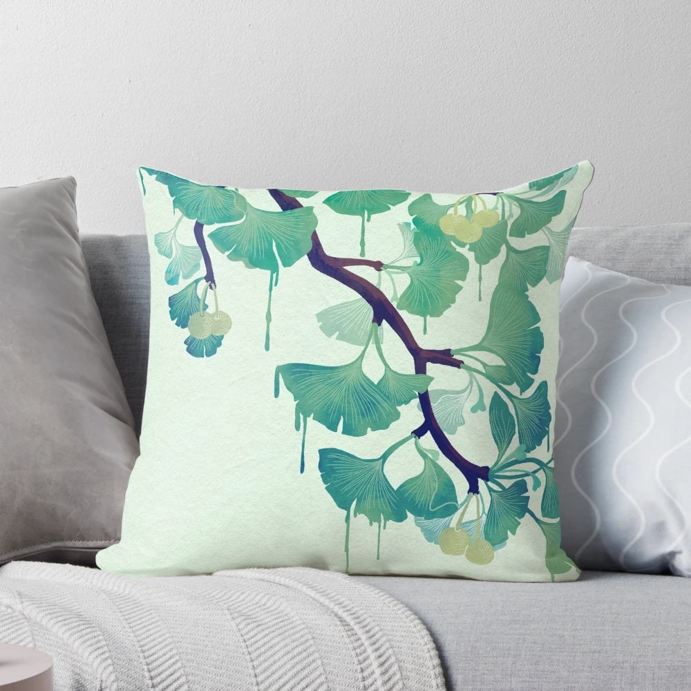 Green pillow with a ginkgo leaf design, showcasing a surreal, melting effect