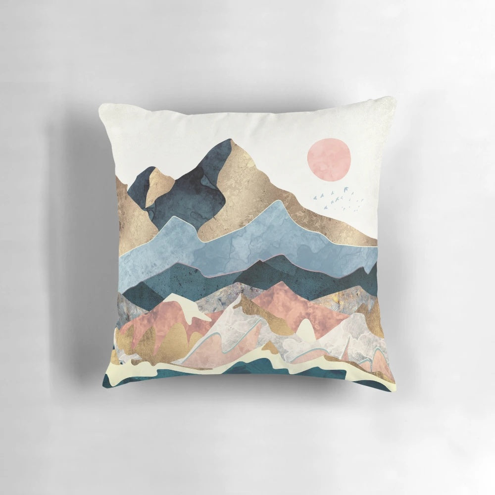 Golden Peaks Pillow with abstract landscape design