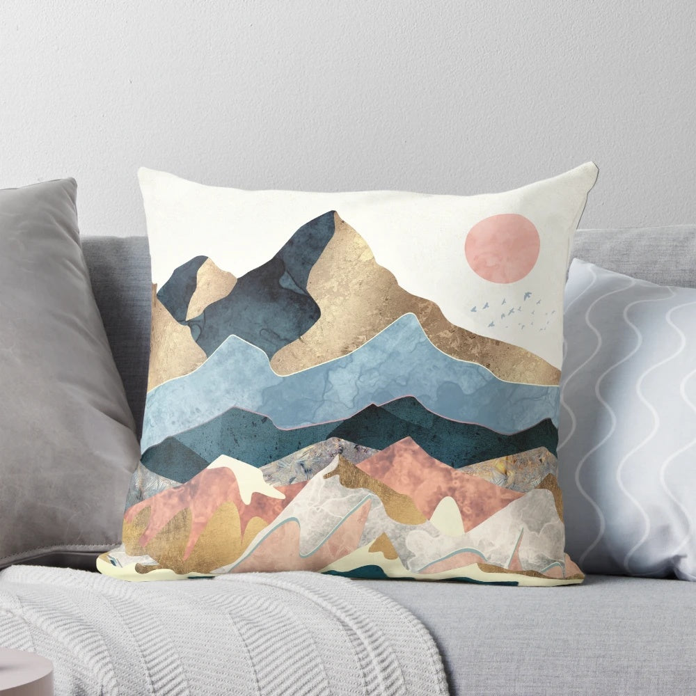 Golden Peaks Pillow with abstract landscape design