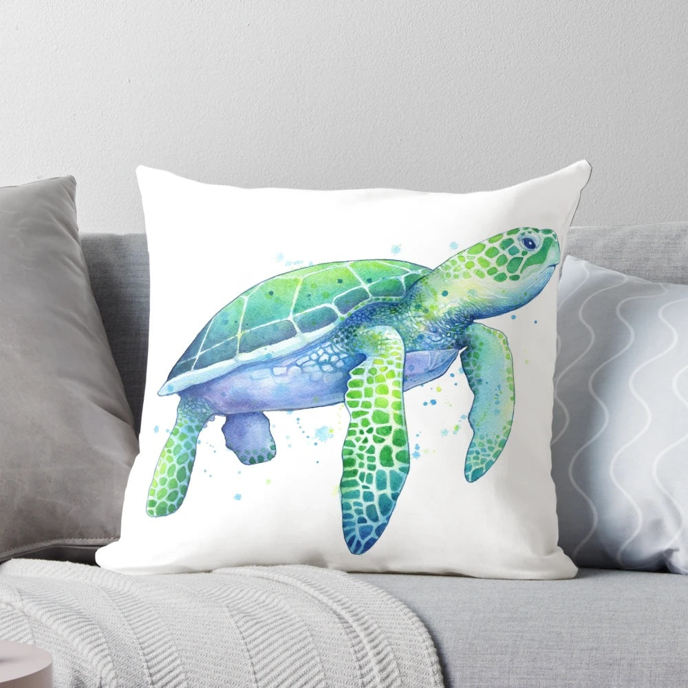 Soft, plush pillow featuring a watercolor painting of a green sea turtle swimming in the ocean