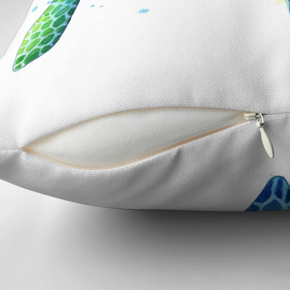 Soft, plush pillow featuring a watercolor painting of a green sea turtle swimming in the ocean