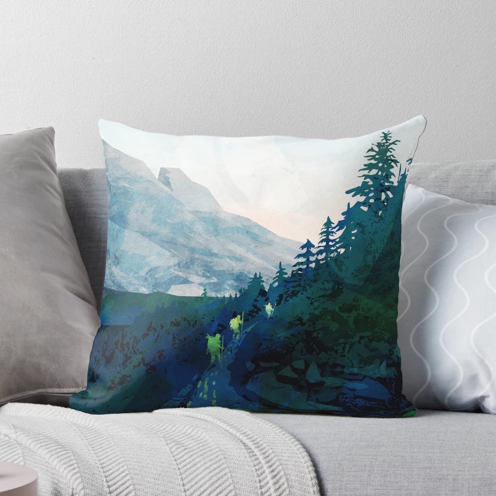 Jade-colored landscape pillow featuring a scenic mountain and sunset design, inspired by the natural heritage of Canada.