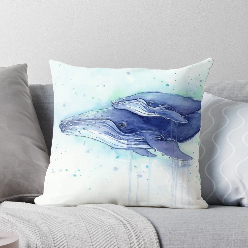 Soft, pastel-colored painting of a humpback whale mother and calf swimming in the ocean, printed on a comfortable throw pillow.
