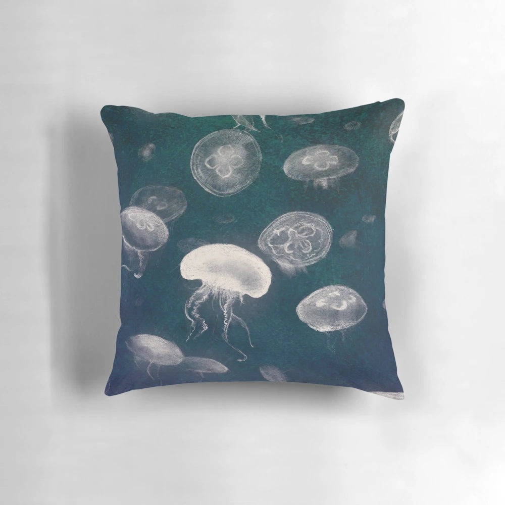 Soothing jellyfish pillow in shades of blue, creating a tranquil underwater scene