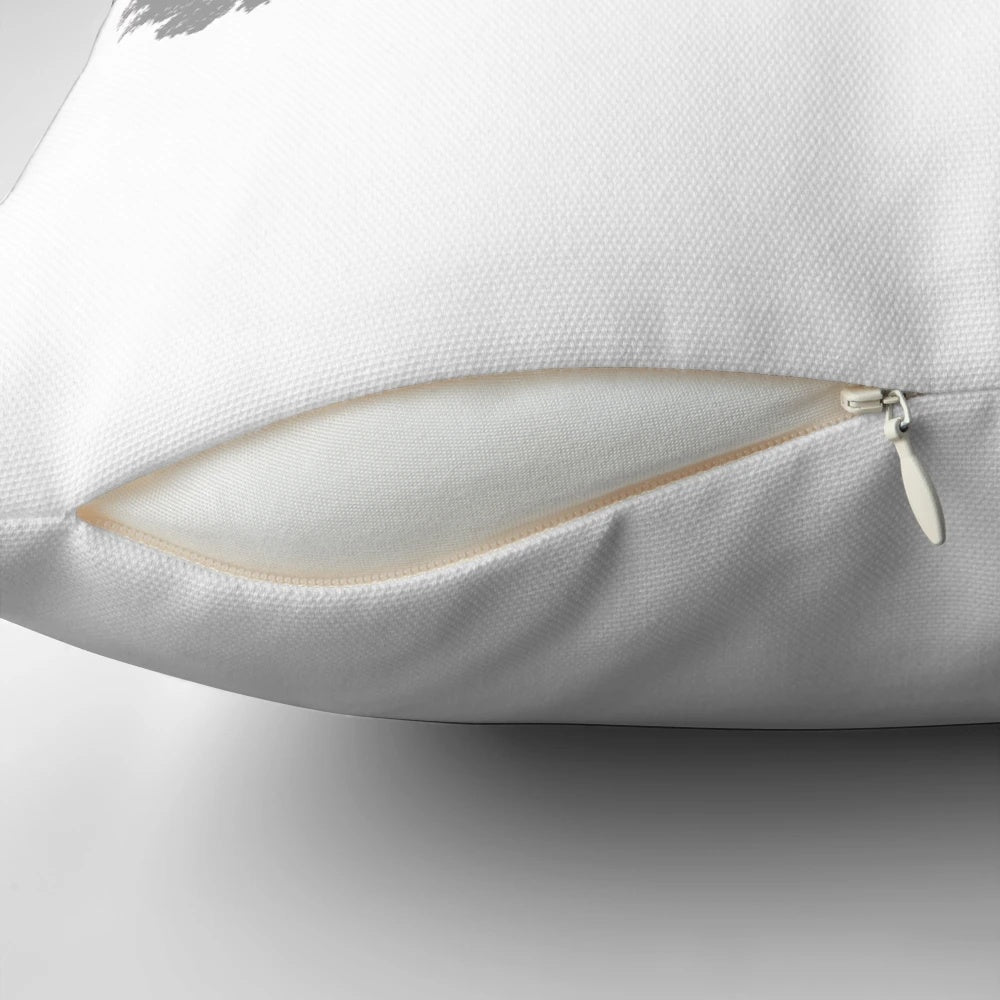 Artistic pillow design featuring a guitar silhouette against a nature landscape background