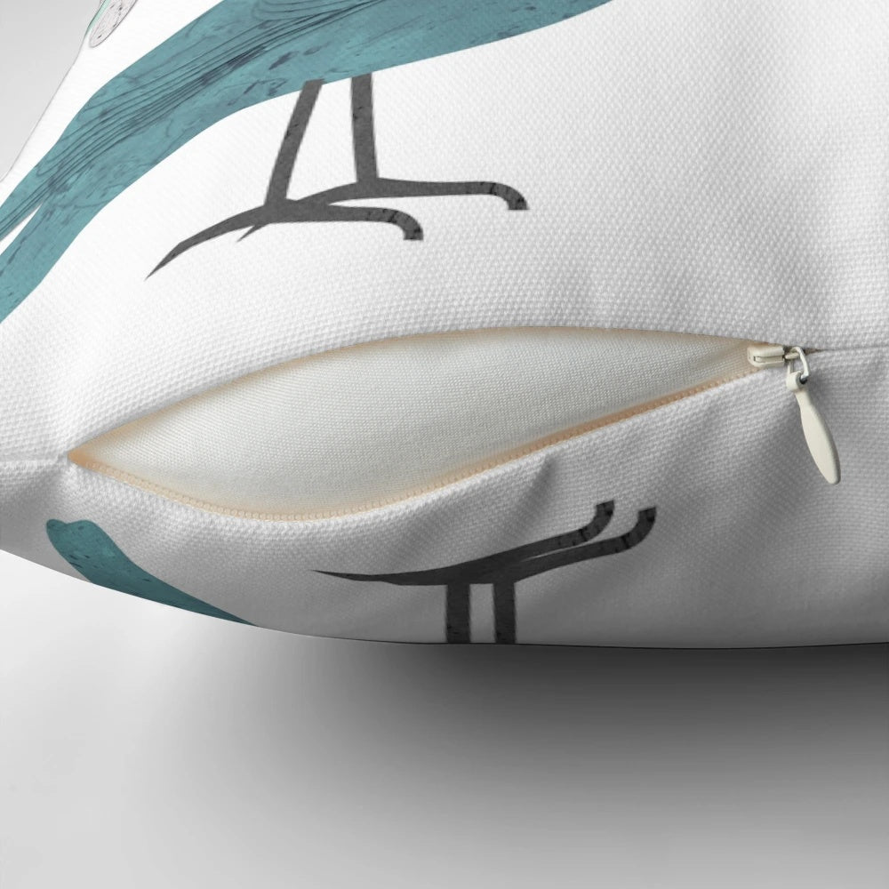 Decorative throw pillow featuring a collage-style design of birds, daisies, and nature-inspired elements in teal, blue, and green colors.