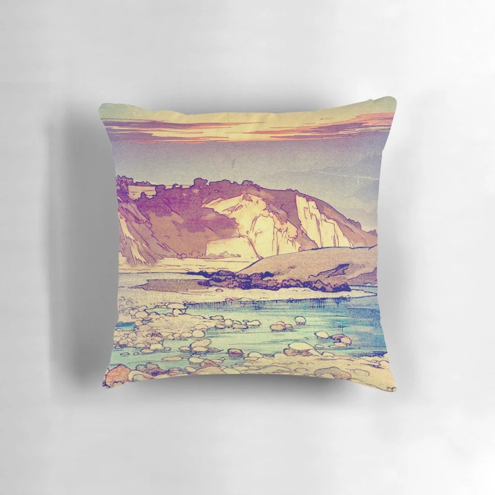 A cozy throw pillow featuring a beautiful sunset landscape with mountains, trees, and a rushing stream in an Asian-inspired setting.