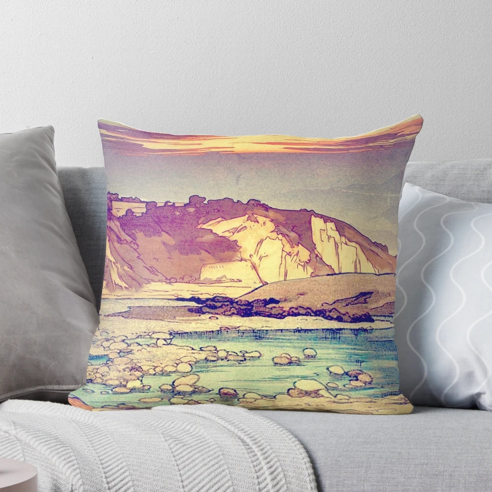 A cozy throw pillow featuring a beautiful sunset landscape with mountains, trees, and a rushing stream in an Asian-inspired setting.