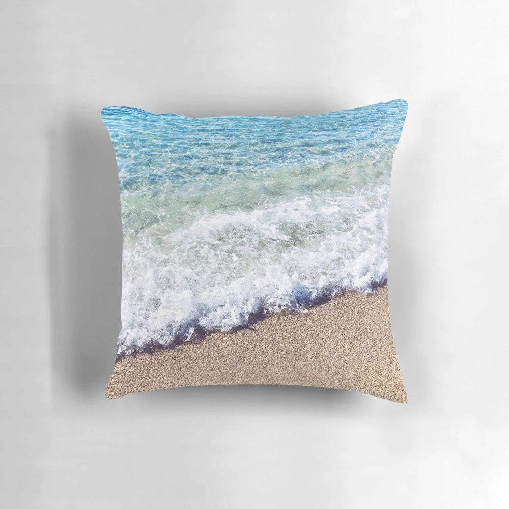 Soft, plush pillow featuring a serene ocean blue shore waves design, perfect for tropical beach-inspired home decor.