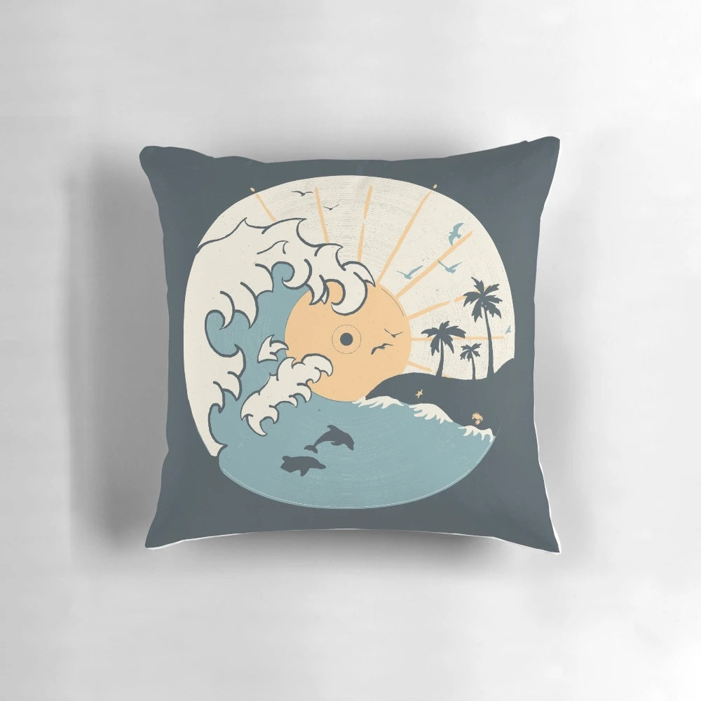 A soft, nature-inspired pillow featuring a tranquil ocean scene with waves, dolphins, and a beautiful sunrise or sunset.