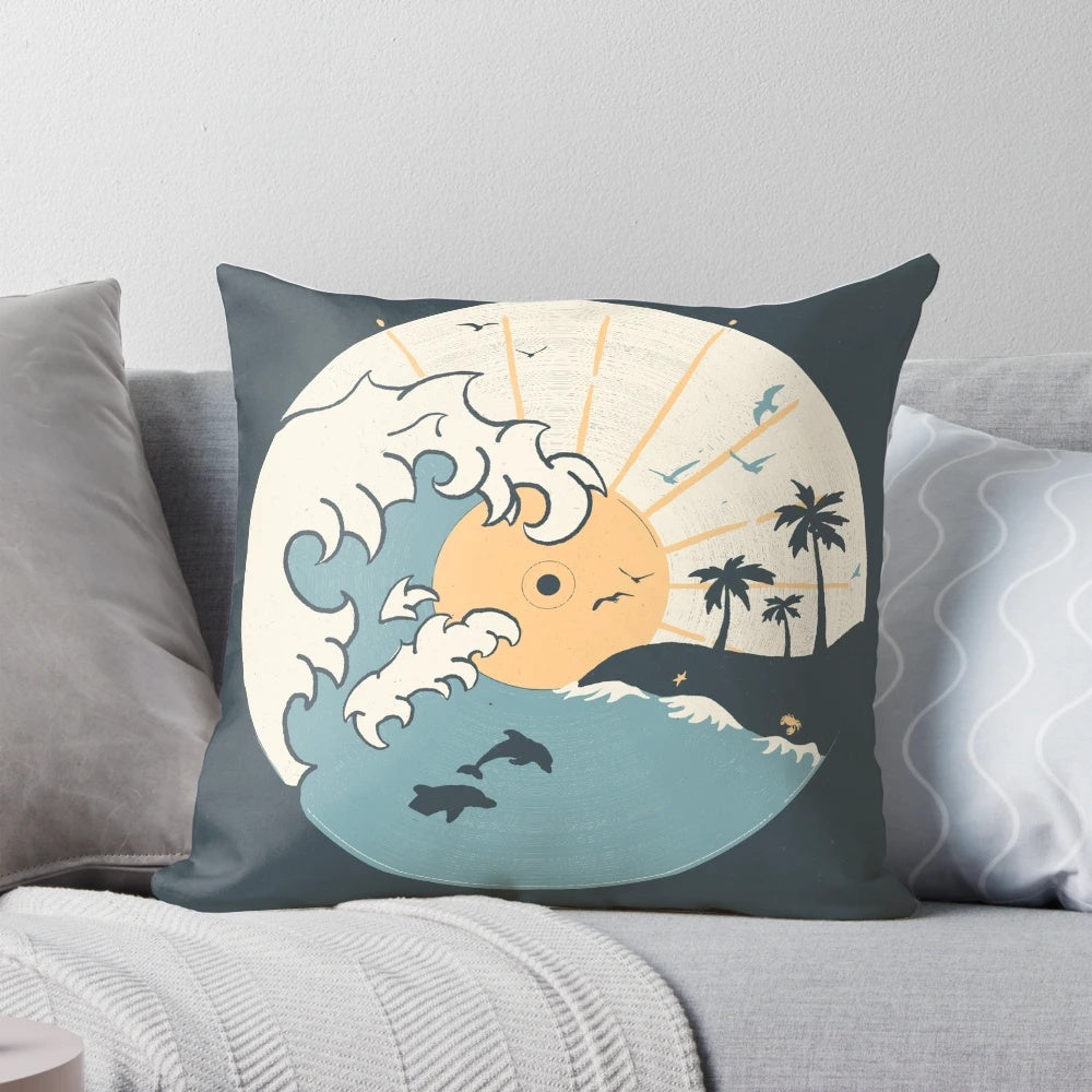 A soft, nature-inspired pillow featuring a tranquil ocean scene with waves, dolphins, and a beautiful sunrise or sunset.