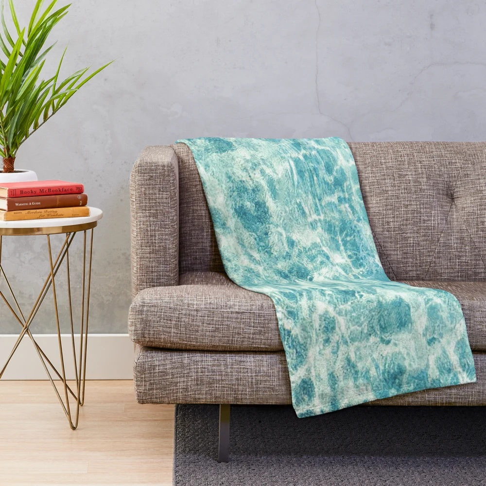 Soft and plush blue aqua blanket with ocean water design