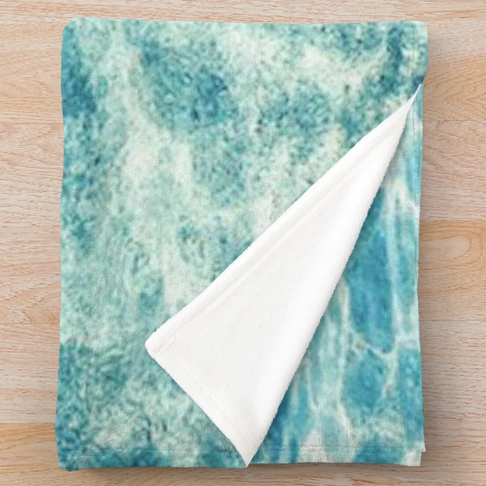 Soft and plush blue aqua blanket with ocean water design