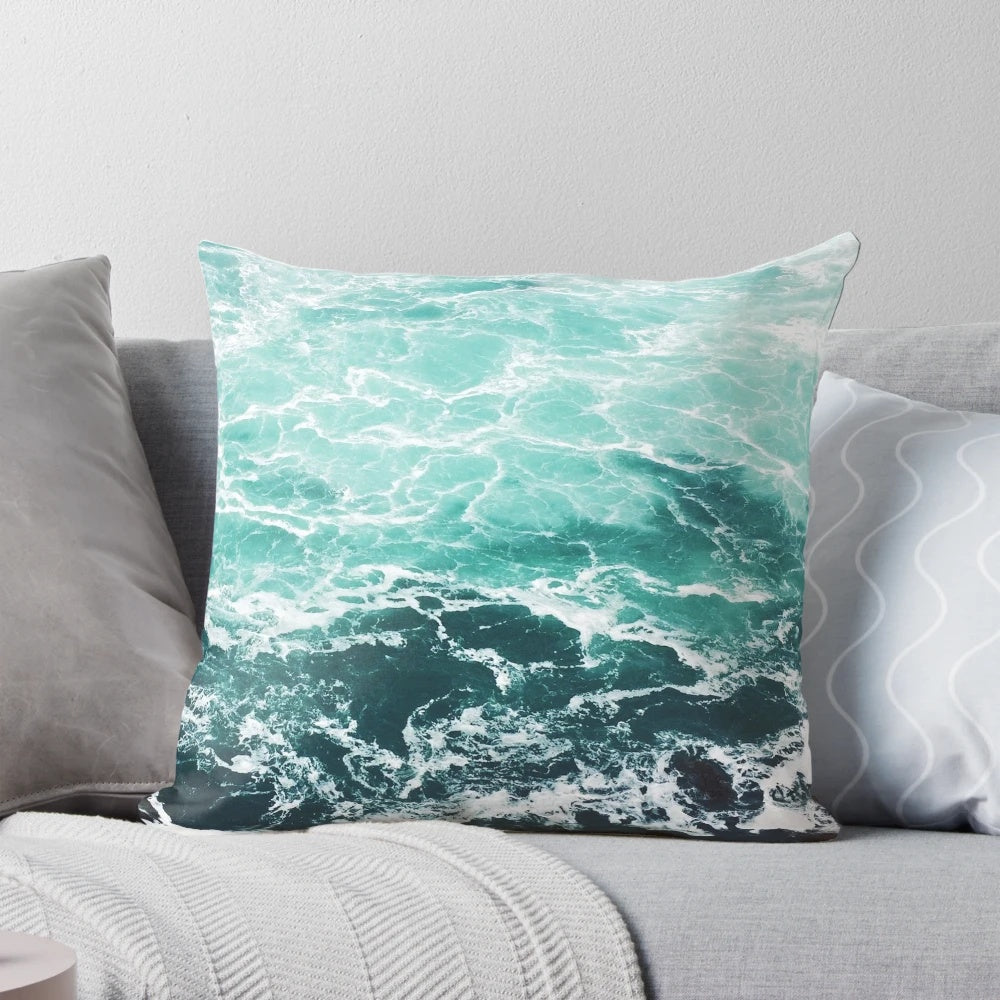 Soft, vibrant beach-themed pillow with ocean waves design